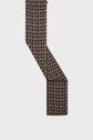 A long, rectangular echarpe fine with a repeating imprimé géométrique in brown, blue, and beige colors, shown flat on a light background. Crafted from laine et soie, the scarf features slightly fringed edges for an elegant touch.