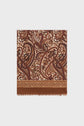 Rectangular écharpe laine soie adorned with intricate imprimé cachemire and floral patterns in shades of brown, maroon, and cream. The bottom edge features a solid brown border with small fringes, making this elegant écharpe brune a versatile accessory. The background is plain white.