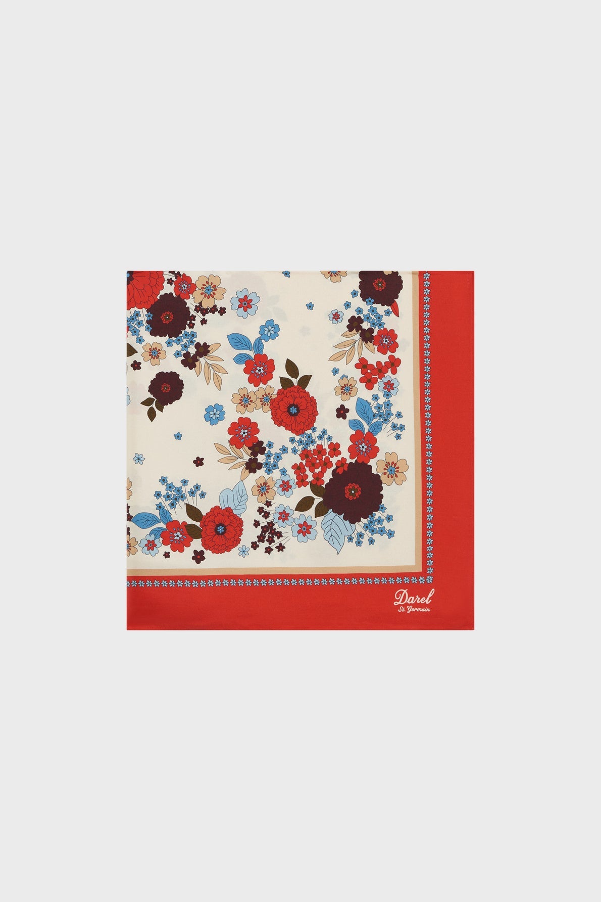 A square scarf with a red border and a motif floral in red, blue, and brown on a cream background. This élégant foulard femme features the word Dond in the bottom right corner, adding a subtle touch to its esprit carré rétro.