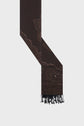 A long, dark brown écharpe laine with subtle imprimé cachemire patterns and decorative fringe at one end, displayed on a plain light background.