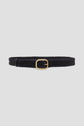 A chic ceinture femme, this black ceinture tressée features a square gold buckle and is displayed elegantly on a light gray background.