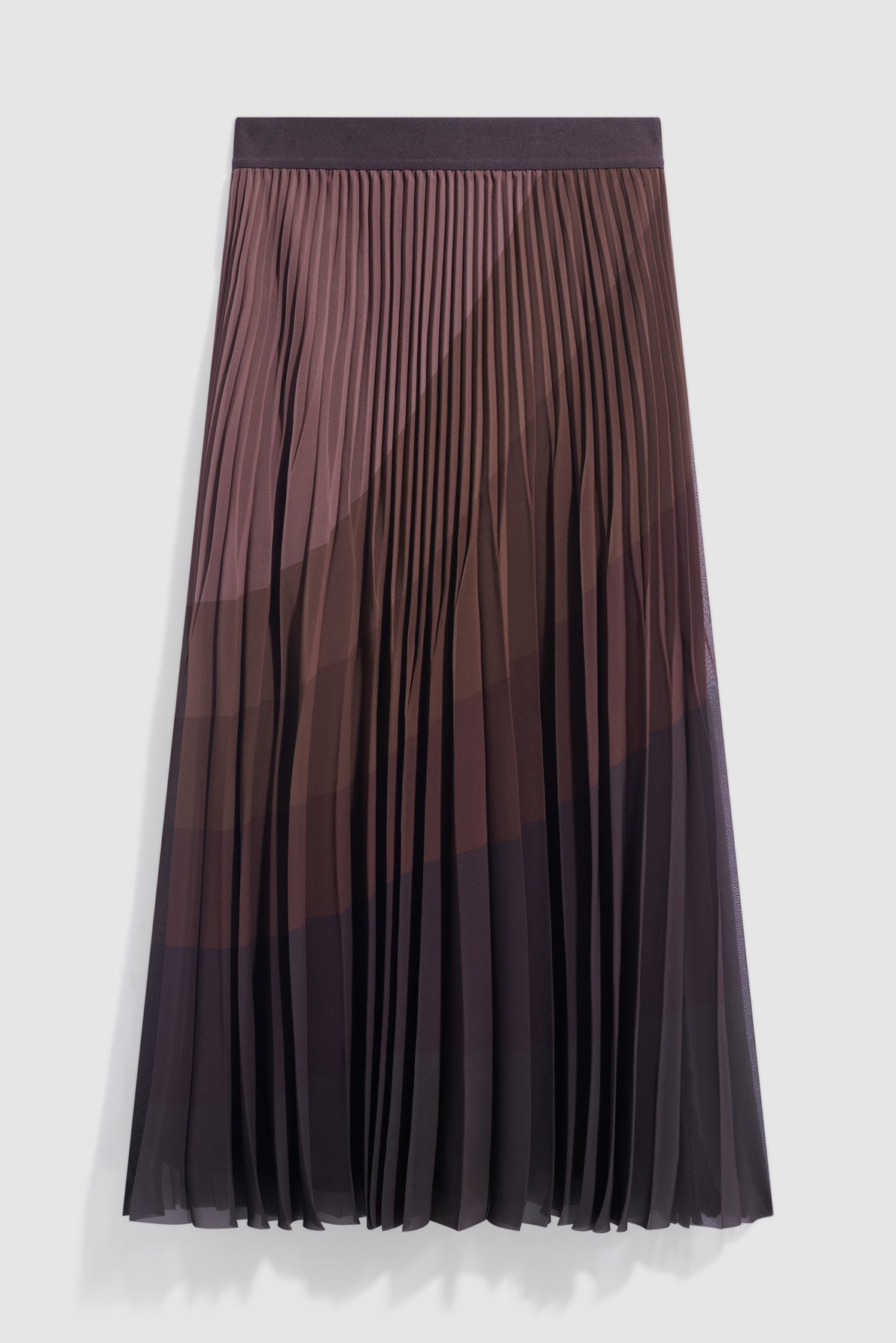 A jupe plissée midi in gradient shades of brown and black, featuring a taille élastiquée and a flowing, lightweight fabric.