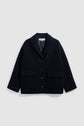 A black wool button-up manteau chic femme with a collar, two front flap pockets, and a relaxed fit, displayed against a plain white background.