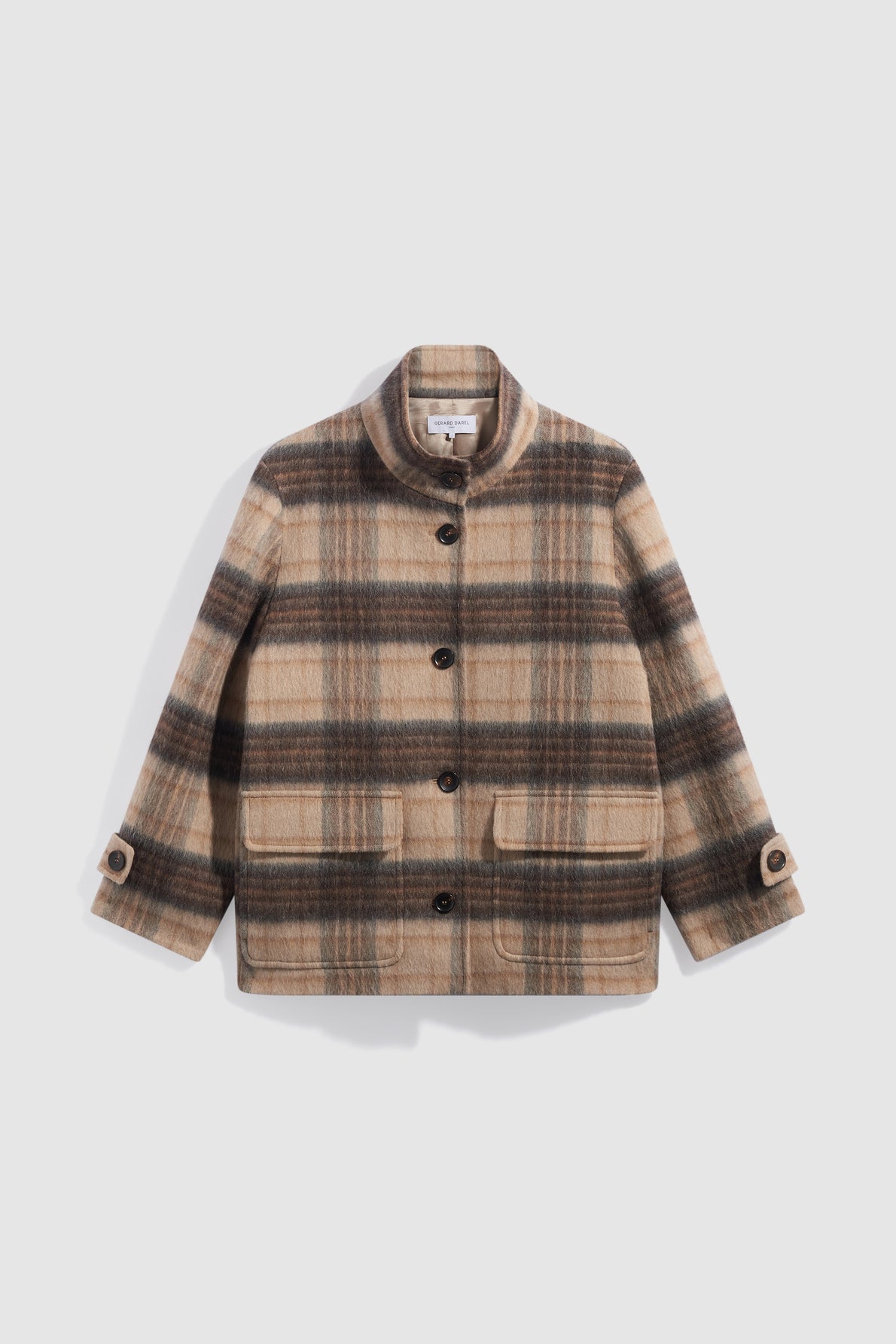 A beige and brown plaid wool jacket, reminiscent of a manteau à carreaux, with black buttons, a collar, two large front pockets, and buttoned cuffs, displayed on a plain white background.