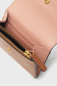Open pink leather wallet with gold zipper and button closure, showing multiple card slots, a zippered coin compartment, and a brown leather zipper pull—this petit portefeuille cuir is designed for women seeking a portefeuille super plat that effortlessly combines elegance with practicality.
