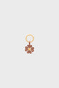 A gold keyring with a flower-shaped charm en cuir in shades of brown and beige, featuring layered petals and a small gold center, set against a plain light gray background—a unique bijou charm that makes a delightful porte-bonheur accessory.