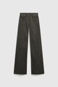 Flat lay of a pantalon taille haute, wide-leg black jeans with subtle all-over motif monogramme and two buttoned front pockets, displayed on a light gray background.