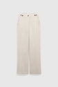 Beige corduroy pants with a straight-leg fit (coupe droite), side pockets, and four brown buttons at the waistband, displayed flat on a plain white background—a perfect choice for a casual chic look.