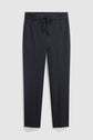 A pair of black drawstring pants with a dos élastiqué and side pockets, featuring a coupe droite silhouette, laid flat on a white background.