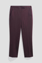 A pair of burgundy dress pants in a coupe slim silhouette with side pockets, front crease, and a flat front waistband, displayed flat against a white background. This pantalon de tailleur features a chic longueur 7/8 for an elegant, modern look.