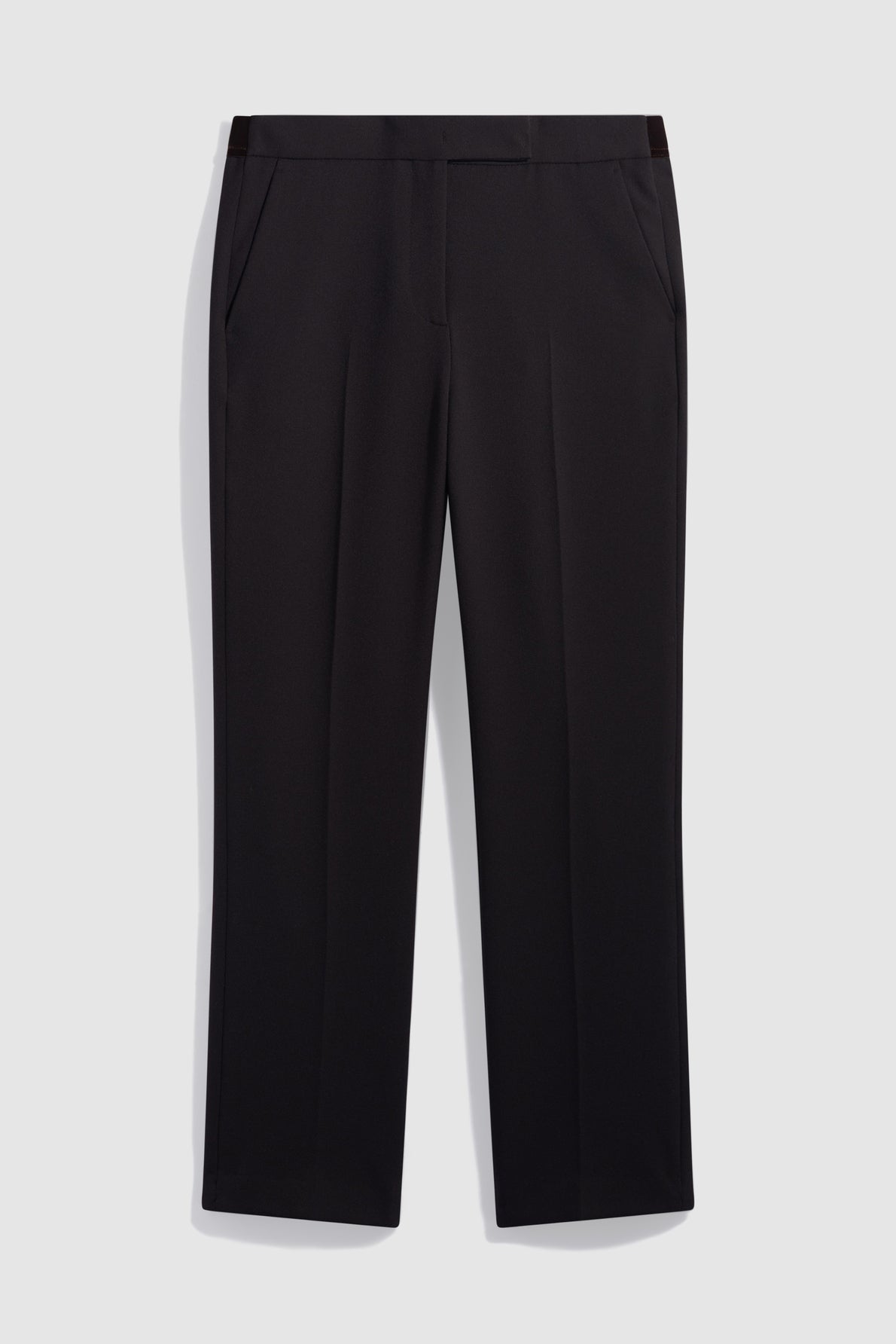 A pair of black dress pants with a coupe droite, side pockets, and a flat front, displayed against a plain light gray background.