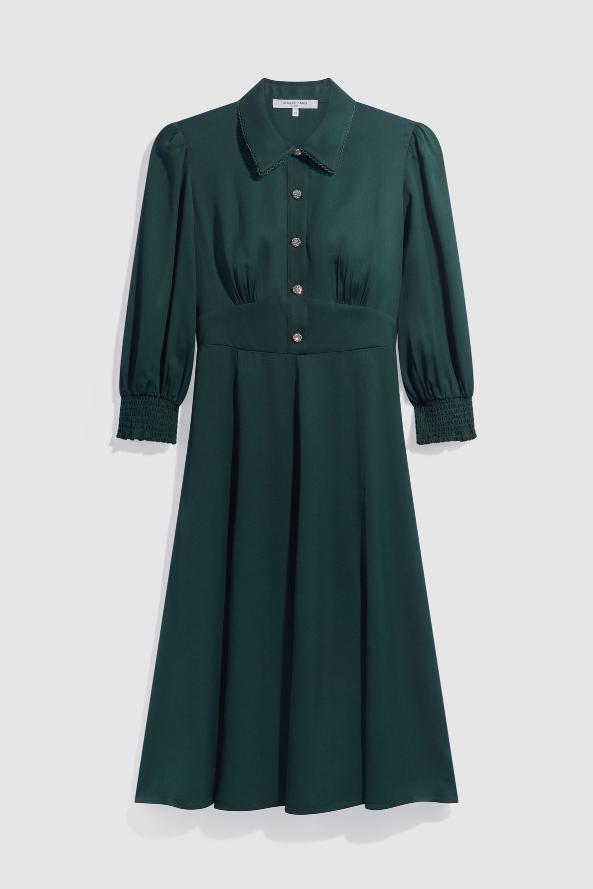 A dark green, knee-length robe midi with long sleeves, a collared neckline, button-down front, and smocked cuffs is displayed against a plain white background.
