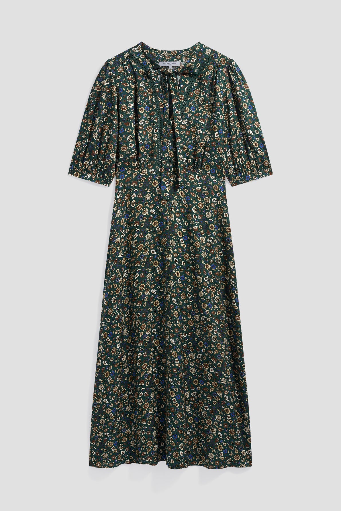 A dark green, short-sleeve robe fluide of longueur midi with a small motif floral, featuring a fitted waist and a tie at the neckline, displayed on a plain light gray background.