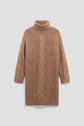 Brown knitted turtleneck sweater dress (robe col roulé) with a cable and diamond pattern, long sleeves, and ribbed cuffs and hem, displayed on a white background.