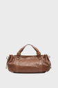 Brown leather sac à main with gold-tone hardware, short handles, and drawstring accents on each side, crafted in elegant cuir froissé and displayed against a plain white background.