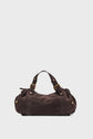 A dark brown cuir velours tressé sac à main with gold buckles, short handles, and gathered sides, set against a plain white background.