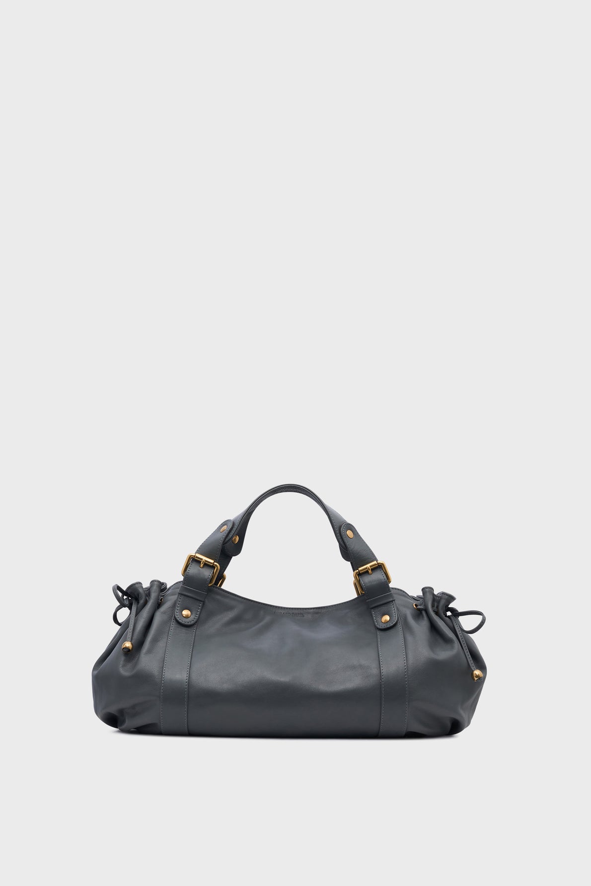 A black leather handbag with gold hardware, short double handles, and gathered sides, reminiscent of the iconic sac 24H from maroquinerie Darel, displayed on a plain light gray background.