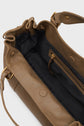 Open tan leather sac à main cuir with a black fabric lining, interior zip pocket, magnetic snap closures, and gold-tone hardware—an elegant addition to the iconic maroquinerie Darel collection inspired by the timeless sac 24H.