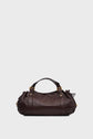 Dark brown Vanessa Bruno sac à main cuir with gold hardware, two short handles, and gathered sides, displayed against a plain light gray background.