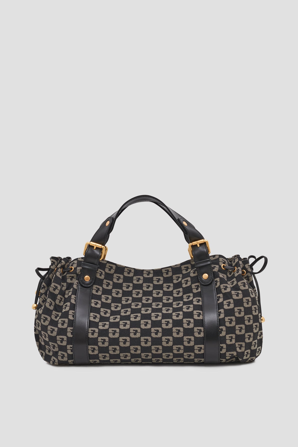 A rectangular sac à main jacquard duffel handbag with black leather handles and trim, gold hardware, and a black and beige checkered pattern featuring small D shapes.