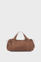 Brown suede sac à main with two handles, gold hardware, side drawstring details, and a rectangular shape, set against a plain white background. This chic accessory subtly echoes the timeless allure of toile bicolore design.