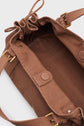 Open brown fabric sac à main tote bag with gold-tone hardware, visible straps, snap closures, and an empty interior crafted in GD Canvas against a plain background.