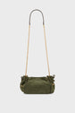 Olive green cuir velours suede handbag with gold chain shoulder strap, small side bows, and gold hardware, set against a plain light background—this elegant sac 24H mini sac bandoulière is the perfect touch of sophistication for any outfit.