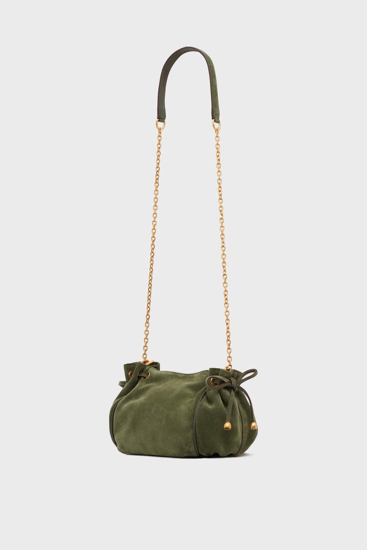 Small olive green *cuir velours* suede bag with gold chain sac bandoulière shoulder strap, leather top handle, and drawstring sides, set against a plain white background.