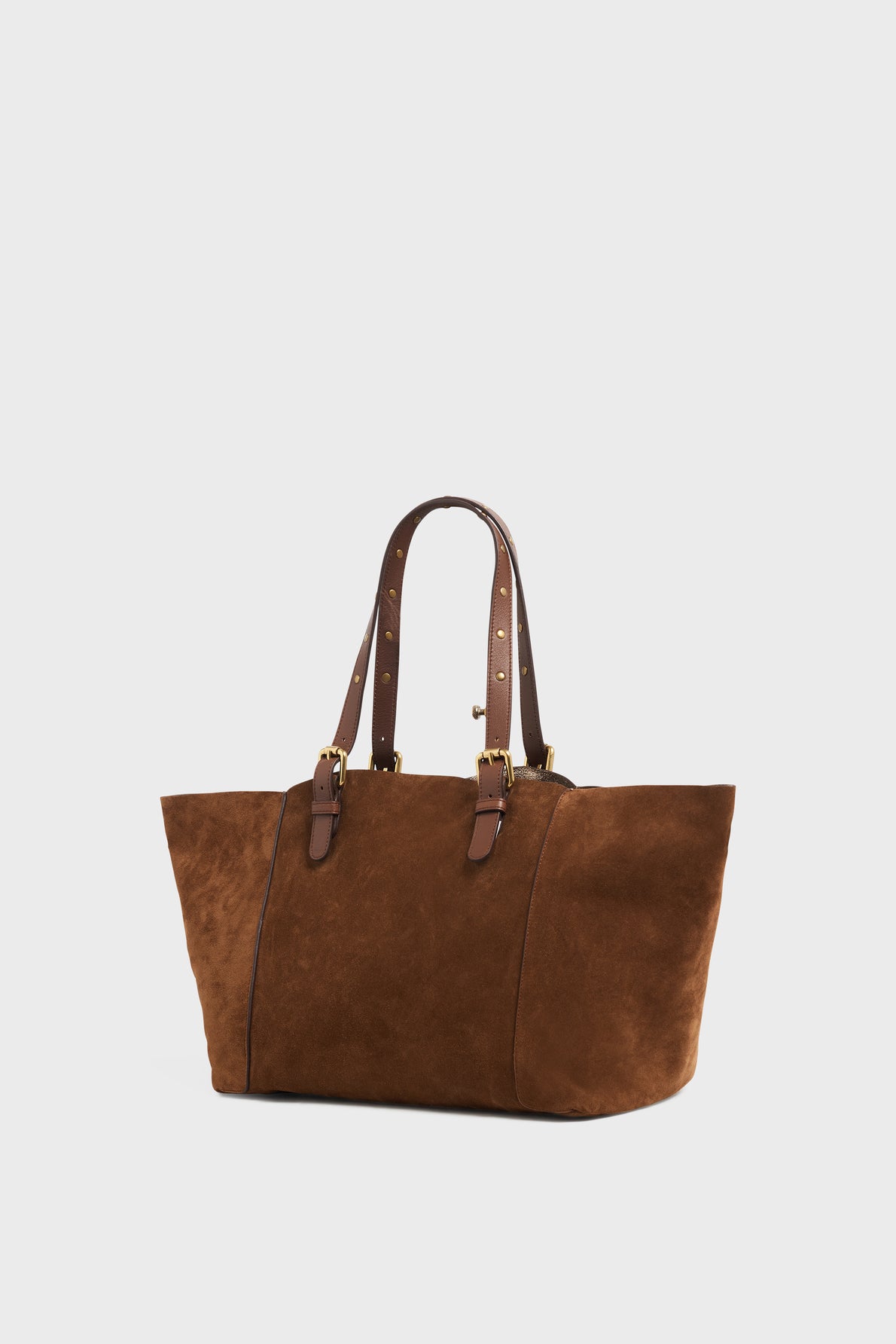 Brown suede tote bag with two dark brown leather handles featuring gold hardware and stud accents, this elegant cabas cuir is perfect as a sac épaule for the modern woman. Set against a plain white background.
