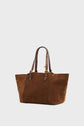 Brown suede tote bag with two dark brown leather handles featuring gold hardware and stud accents, this elegant cabas cuir is perfect as a sac épaule for the modern woman. Set against a plain white background.
