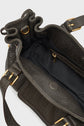 Open dark brown sac à main in cuir bubble with gold hardware, showing its fabric-lined interior, zippered pocket, and drawstring-style top edge.