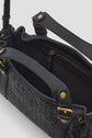 Black woven leather sac à main tressé with gold hardware, showing the inside with a zippered pocket and an open main compartment. The bag has two handles with buckle details, perfect as your next it-bag 12H.