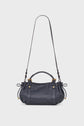 A navy blue sac à main in luxurious cuir, featuring gold hardware, a top handle, adjustable bandoulière amovible, and side cinch details, set against a plain white background.