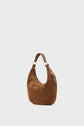 A chic Parisienne brown sac hobo crafted from luxurious cuir velours, featuring a single leather strap, gold hardware, and a leather tag, shown against a plain white background.