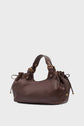 A brown leather handbag with gold hardware, double handles, and drawstring details on the sides, displayed against a plain white background. This sac à main cuir captures the essence of élégant français style and is reminiscent of the refined design found in a sac CHIARA GD.