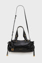 A black cuir froissé leather sac à main with gold hardware, two handles, a long adjustable shoulder strap, side drawstring details, and a small logo tag on the front—exuding un véritable chic à la française.