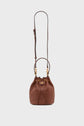 A brown leather sac seau cuir with gold hardware, a drawstring closure, and an adjustable shoulder strap—a versatile sac bandoulière femme—photographed against a plain white background.