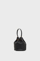 A black leather bucket bag, inspired by the timeless élégance of the seau Naomi, features gold eyelets, a drawstring closure, and a single rounded handle. This sac seau cuir is shown against a plain light gray background.