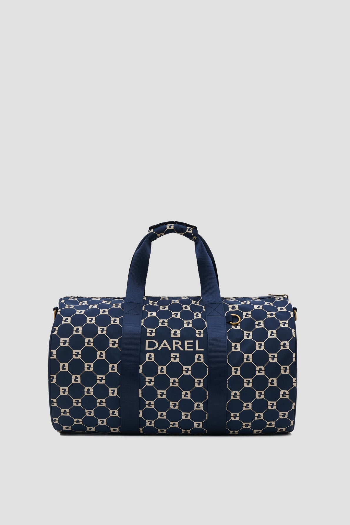 A navy blue sac de sport duffel bag with a geometric white pattern, two handles, and the word DAREL printed in white on the front.
