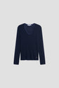 Navy blue V-neck long-sleeve sweater with a subtle logo tag near the hem, reminiscent of a classic tee-shirt col V femme, displayed on a plain light gray background.