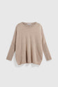 Beige, long-sleeve, oversized pull en cachemire with a round neckline and coupe ample, displayed on a white background.