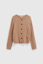 A beige, cable-knit gilet à torsades crafted from luxurious laine mérinos, with long sleeves, dark buttons down the front, ribbed cuffs and hem, and a slightly cropped fit, displayed on a plain white background.