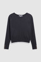 A black long-sleeve maille à côtes sweater with scalloped edges at the cuffs and neckline, featuring three decorative buttons on each cuff, displayed on a white background.