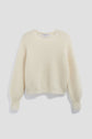 A cream-colored, long-sleeve, crew neck knit sweater with a ribbed texture and slightly loose fit, this élégant pull écru is beautifully displayed against a plain light background.