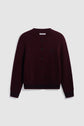 A bordeaux knit cardigan with black buttons, ribbed cuffs and hem, two front pockets, and a subtle embroidered logo on the left chest, reminiscent of a classic gilet en laine, displayed flat on a light gray background.