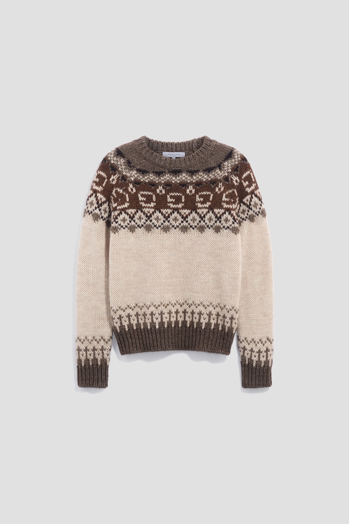 A beige and brown knit sweater with a round neck, featuring a geometric and animal pattern reminiscent of motif Fair Isle across the chest, shoulders, cuffs, and hem. This pull maille épaisse is crafted from soft laine alpaga for added warmth and comfort.