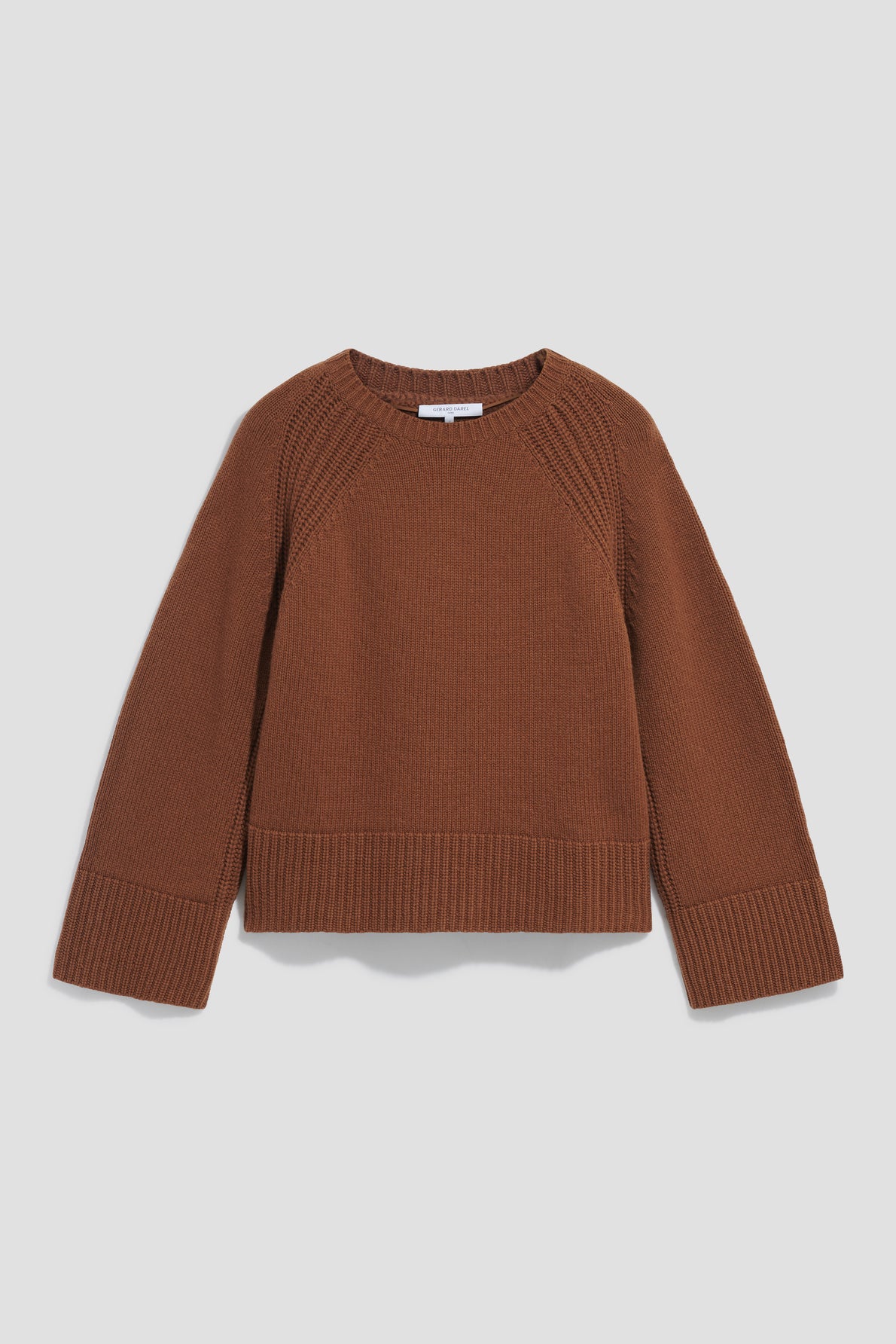 A brown, manches longues ribbed knit sweater with a col rond and wide ribbed cuffs and hem, displayed on a plain white background.