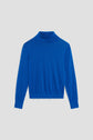 A bright blue long-sleeve pull col roulé sweater is laid flat on a light gray background. Crafted from soft laine mérinos, the sweater features a fitted collar, ribbed cuffs, and a ribbed hem.