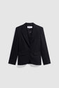 A black, tailored blazer with two buttons and a notched lapel, perfect as a veste bureau chic or veste tailleur noire, displayed against a plain light gray background.