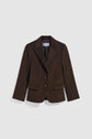 Dark brown veste mi-longue tailleur for women, crafted in soft velours with notched lapels, two buttons, front flap pockets, and a chest pocket, displayed on a plain light background.
